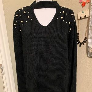 Black knit sweater with pearls